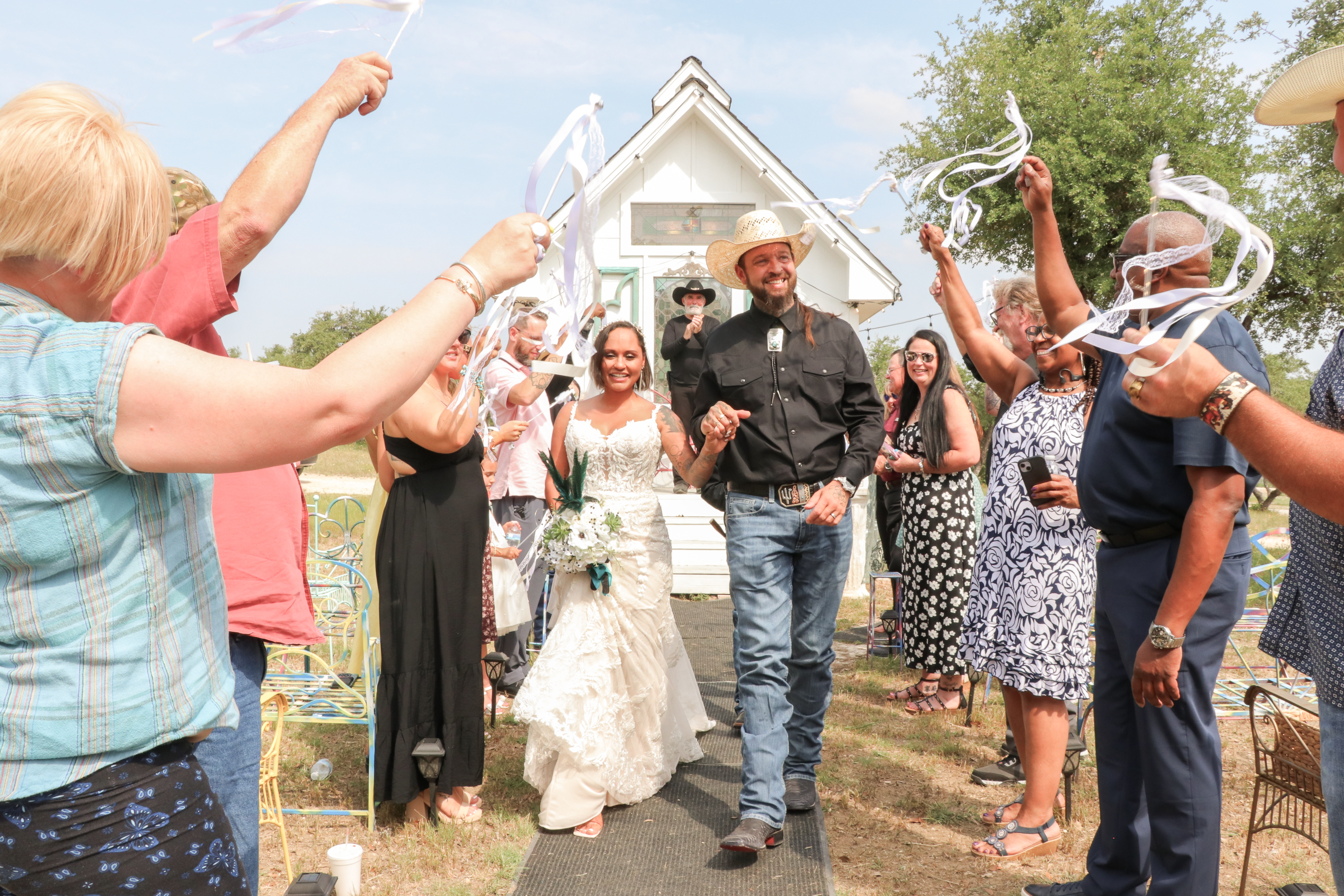 Couple celebrating their micro wedding ceremony outdoors