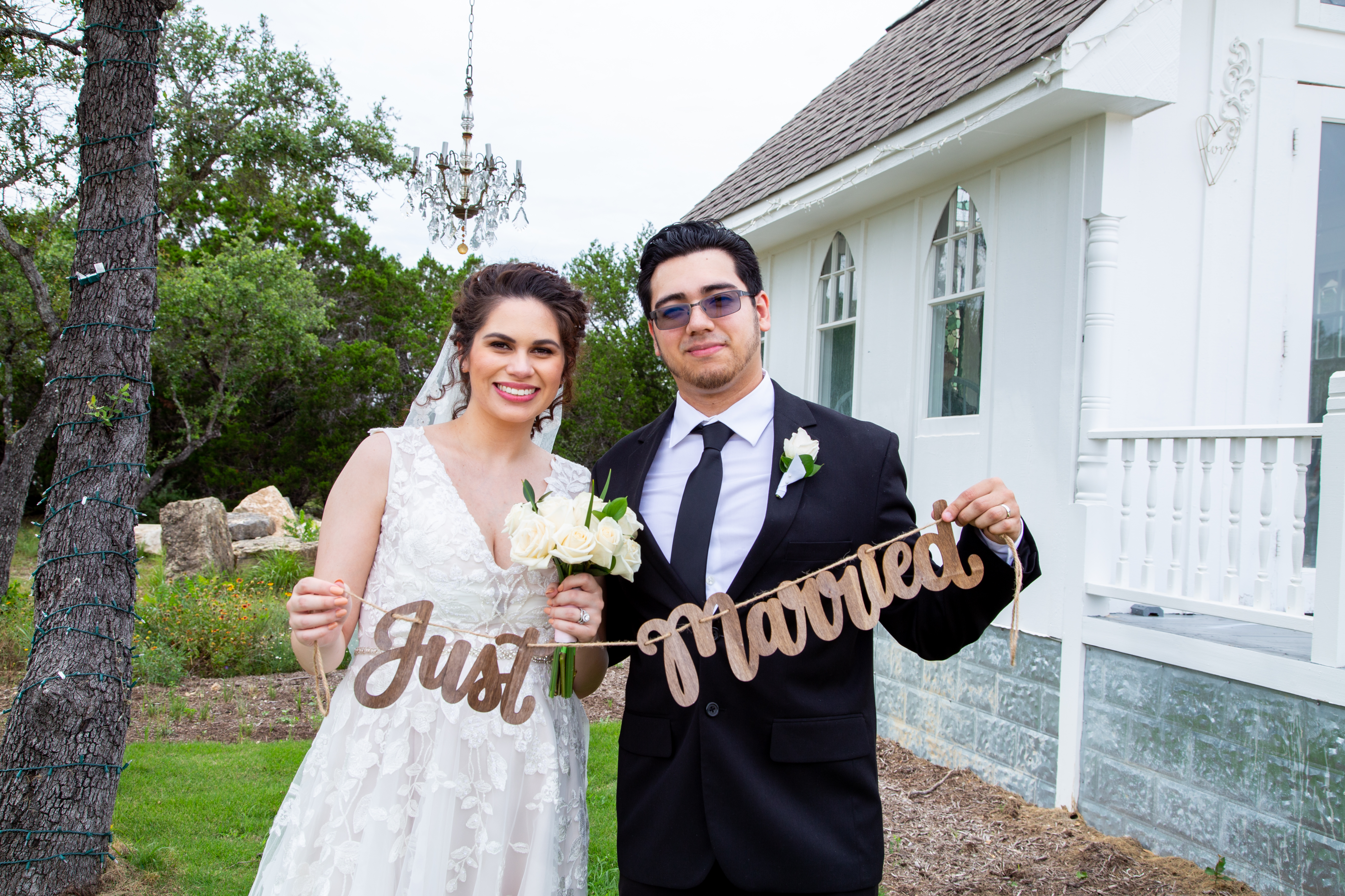 Couple celebrating their wedding ceremony at Chapel of Love ATX private chapel
