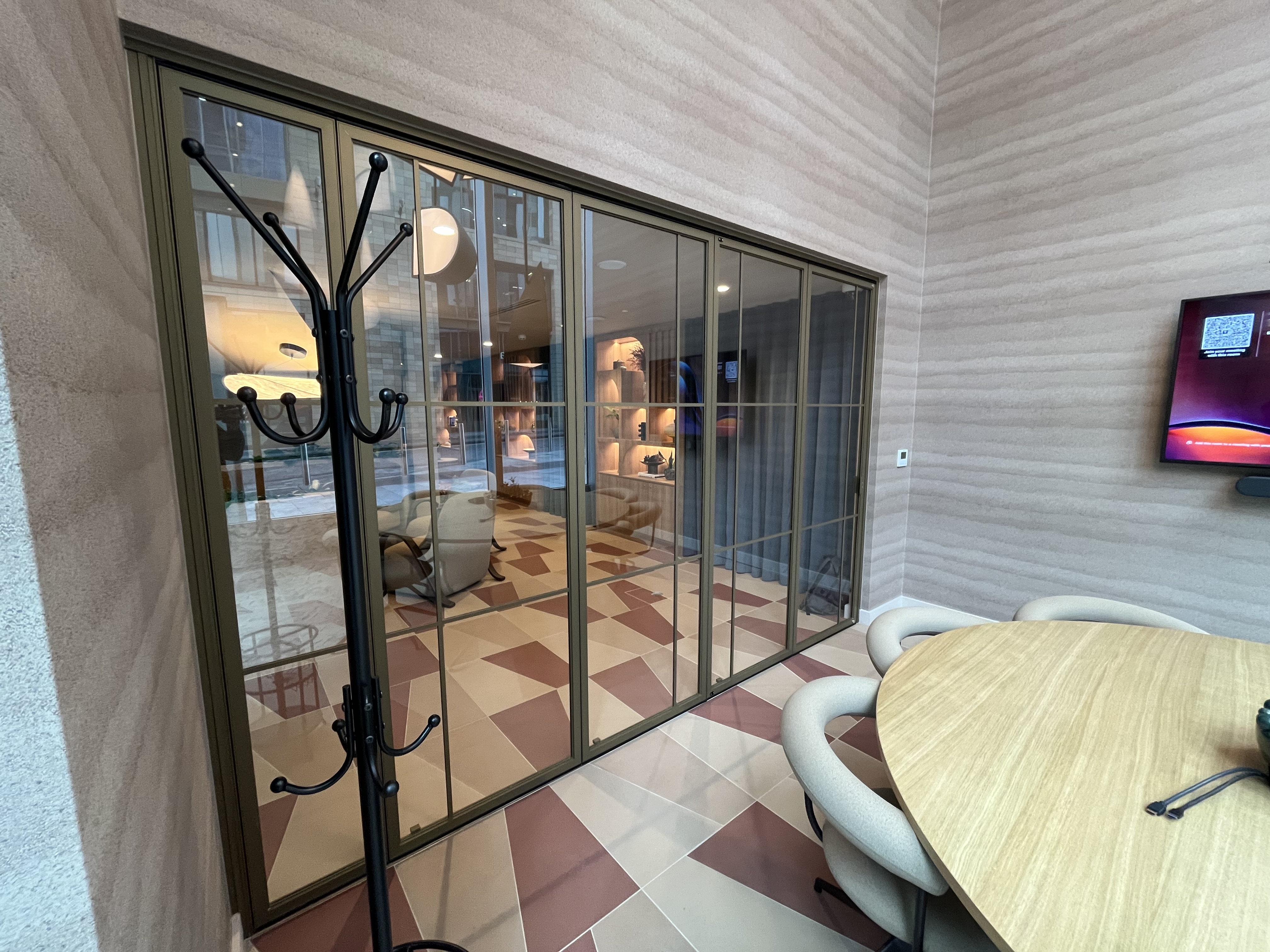MG900 glazed partition installation — commercial interior