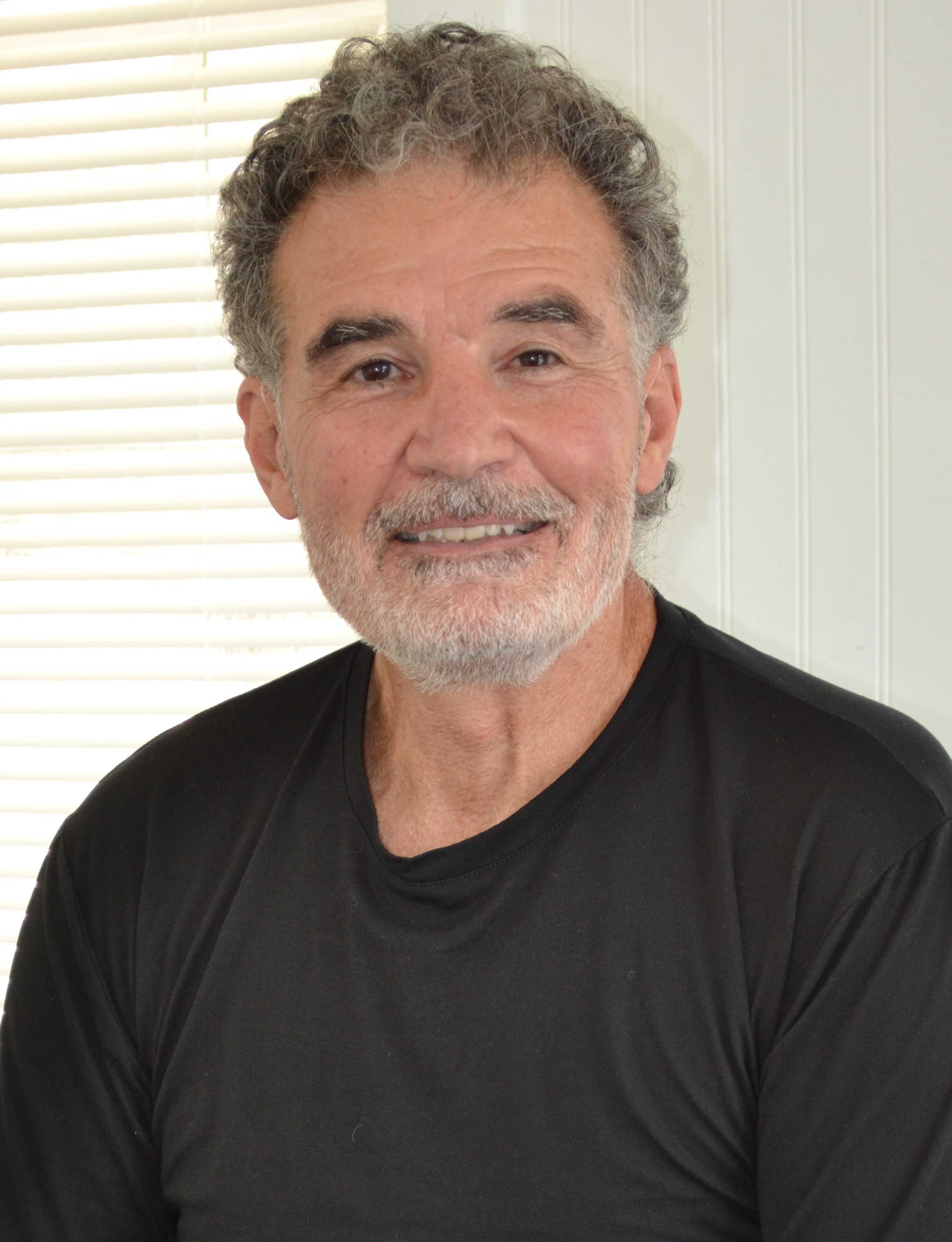 Rev. Ed — Owner / Officiant