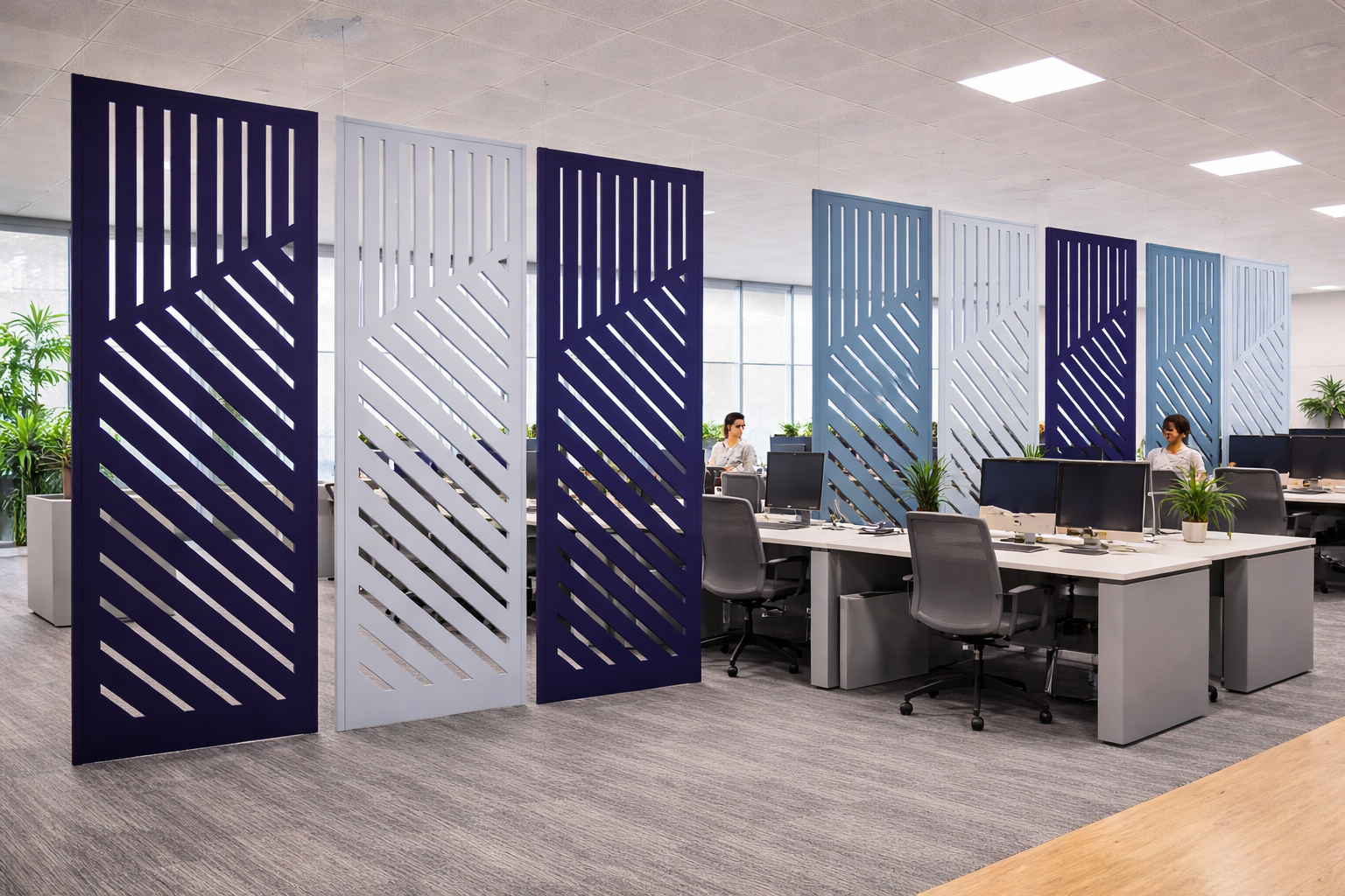 PanelHush PET acoustic hanging panels installed above open-plan office workstations