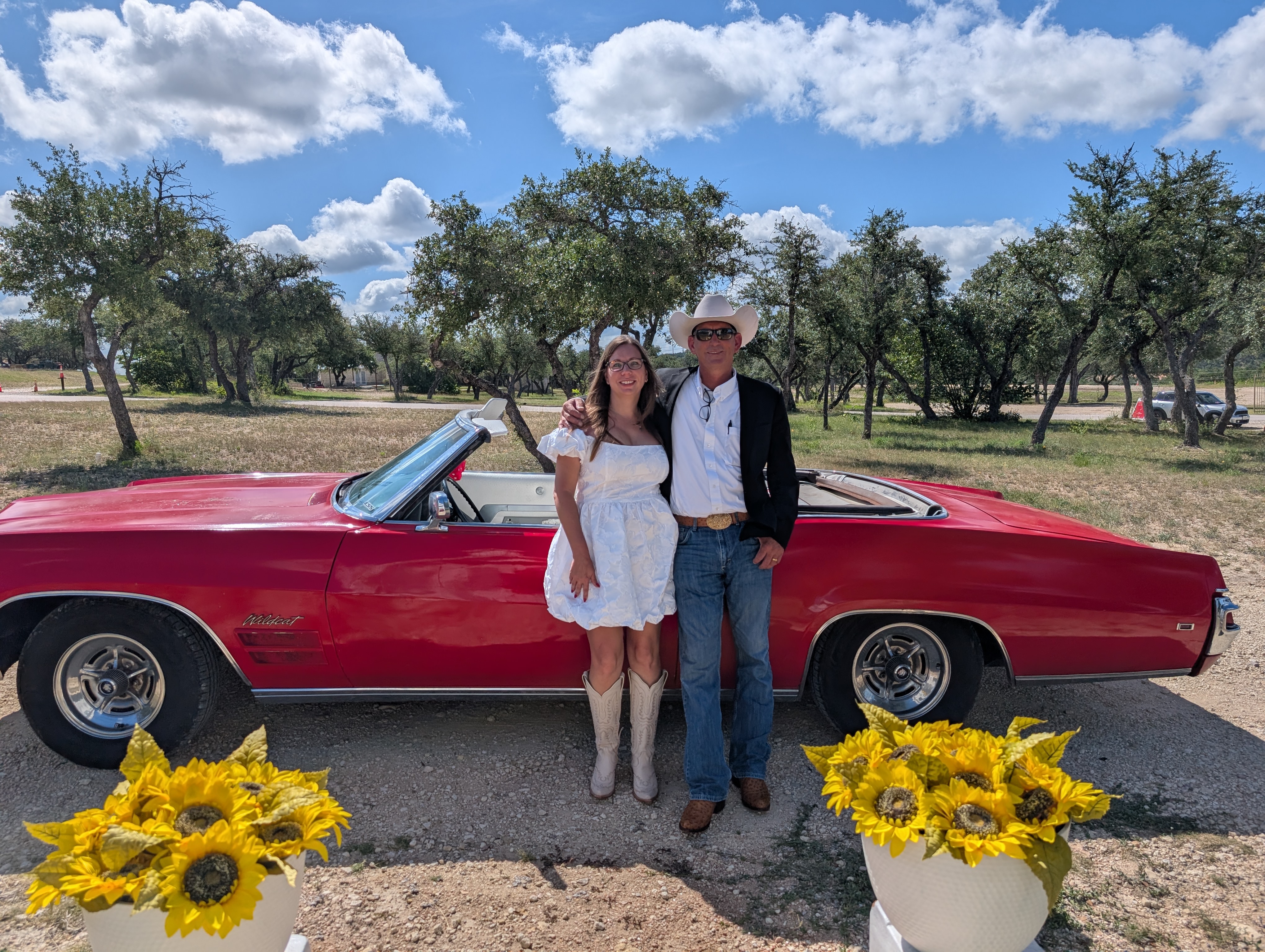 Couple exchanging vows during drive-up elopement ceremony at Star Hill Ranch Austin
