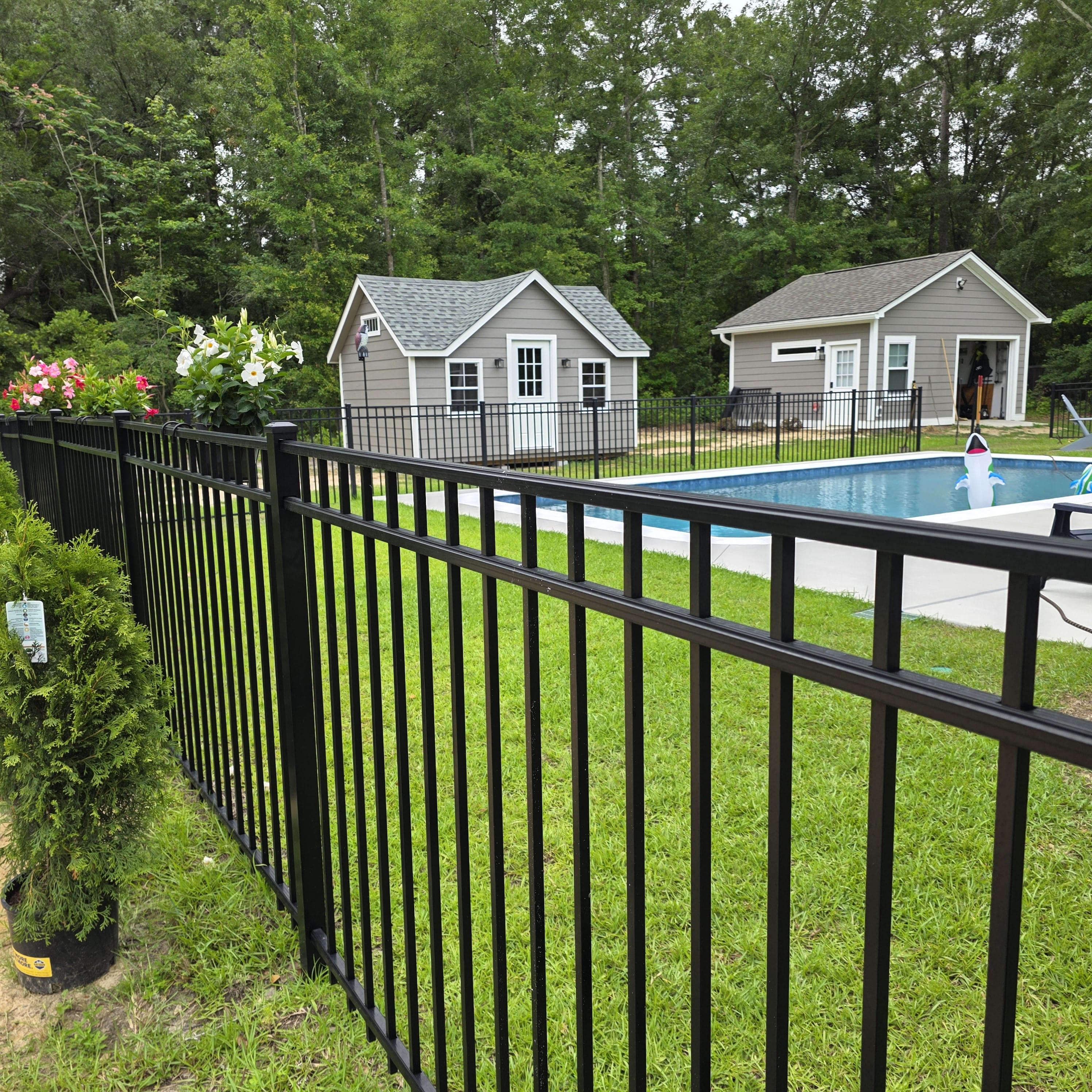 10x16 Cambridge dormer shed installed beside a pool in Summerville, SC