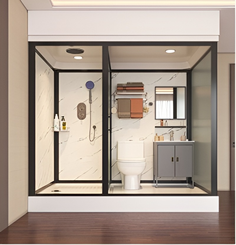 Modern bathroom unit with black-framed glass partitions dividing shower and toilet areas, minimalist hotel design.